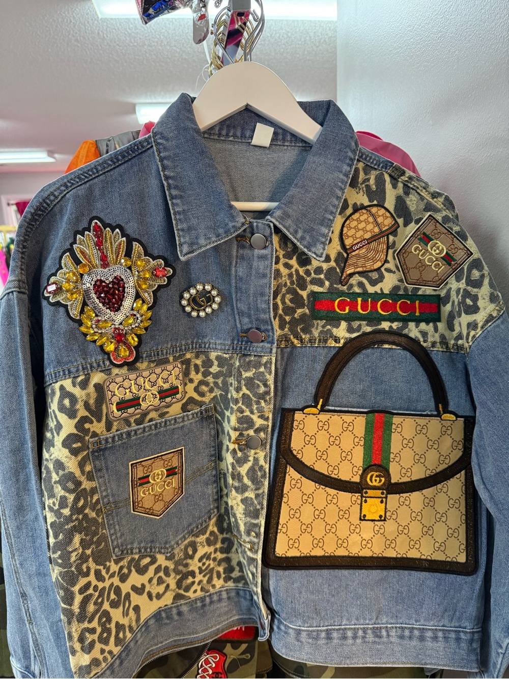 Fashion Inspired Blue Denim Jacket with Leopard Panels and Embellished Patches